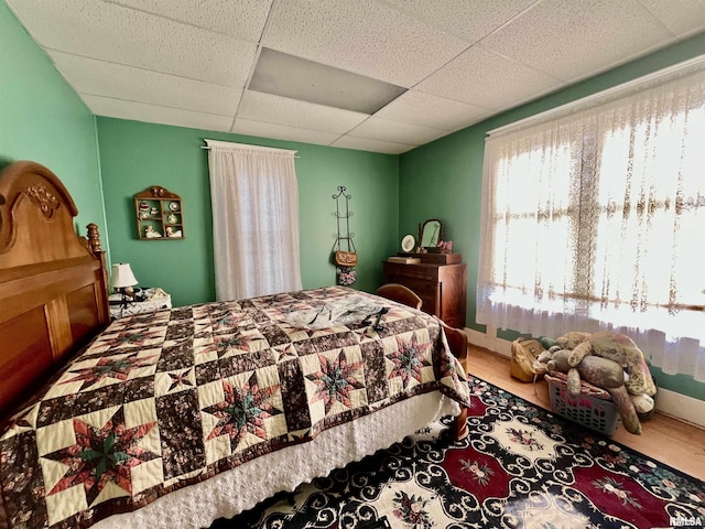 850 Joppa N Ave, Joppa, IL 62953 - bedroom featuring a paneled ceiling and wood finished floors
