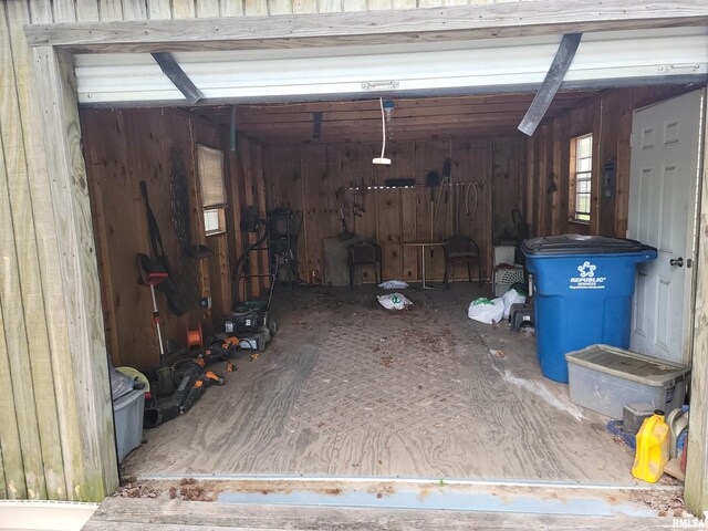 1060 W 5th St, Flora, IL 62839 - garage featuring wood walls