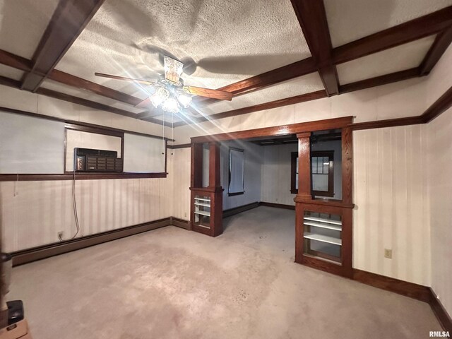 321 S Maple St, Centralia, IL 62801 - below grade area with ceiling fan, carpet floors, a baseboard radiator, and a textured ceiling