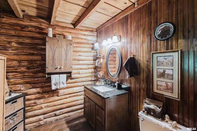 690 Ganntown Ln, Grantsburg, IL 62943 - half bath with log walls, a wooden ceiling with exposed beams, and vanity