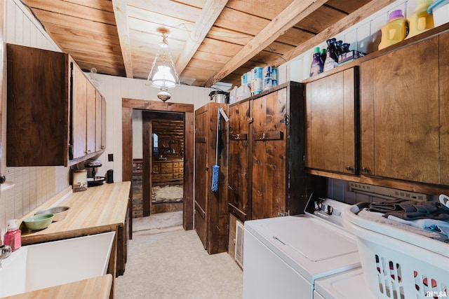 690 Ganntown Ln, Grantsburg, IL 62943 - laundry room with independent washer and dryer and wooden ceiling
