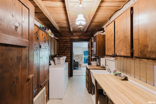 690 Ganntown Ln, Grantsburg, IL 62943 - laundry area featuring washer and clothes dryer and wood ceiling