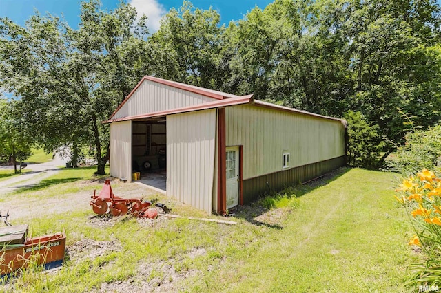 690 Ganntown Ln, Grantsburg, IL 62943 - view of pole building featuring a lawn