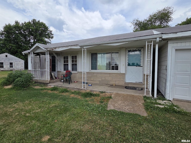 2316 W Main St, Salem, IL 62881 - rear view of house with a yard and stone siding