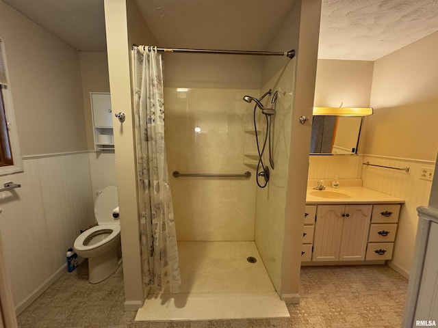 3100 Ava Rd, Murphysboro, IL 62994 - bathroom featuring a wainscoted wall, vanity, and a shower with curtain