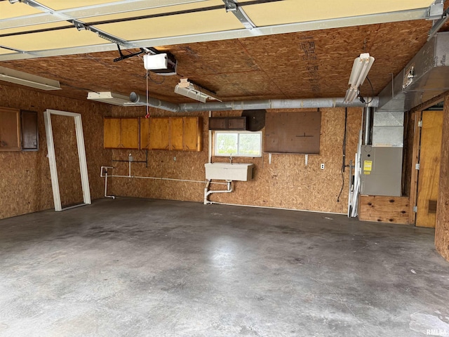 3100 Ava Rd, Murphysboro, IL 62994 - garage with a sink and a garage door opener