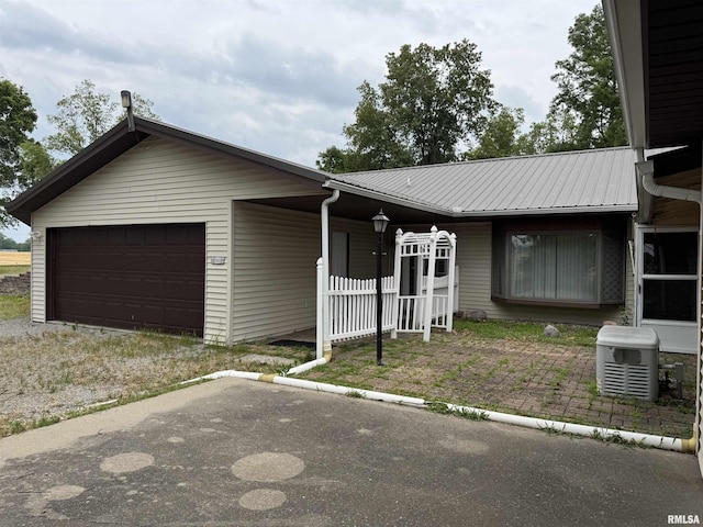 3100 Ava Rd, Murphysboro, IL 62994 - ranch-style home featuring an attached garage and a metal roof