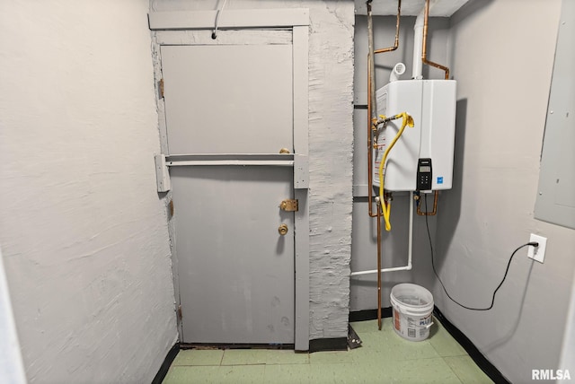 6 S Division St, Duquoin, IL 62832 - utility room featuring water heater and electric panel