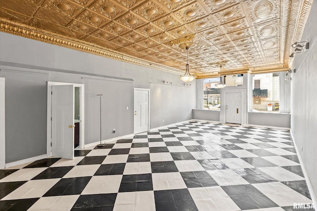 6 S Division St, Duquoin, IL 62832 - unfurnished room with an ornate ceiling, ornamental molding, and tile patterned flooring