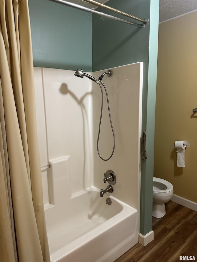 104 Mcneil St, Energy, IL 62933 - full bathroom featuring wood finished floors and shower / bath combination with curtain
