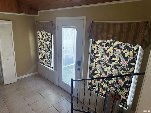 104 Mcneil St, Energy, IL 62933 - doorway to outside with light tile patterned floors, healthy amount of natural light, and wood ceiling