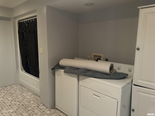 104 Mcneil St, Energy, IL 62933 - laundry room with cabinet space and independent washer and dryer