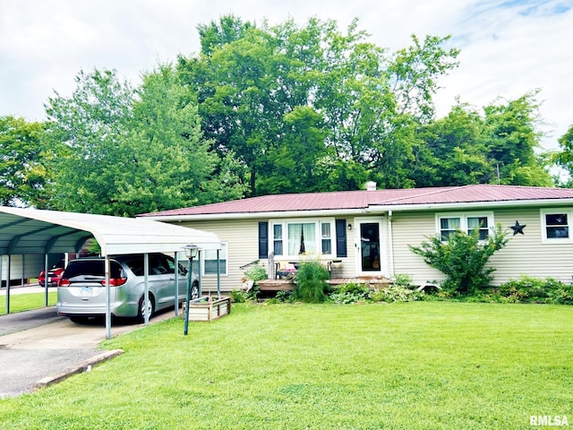 803 Butler St, Metropolis, IL 62960 - ranch-style home featuring a carport, a front yard, a metal roof, and asphalt driveway