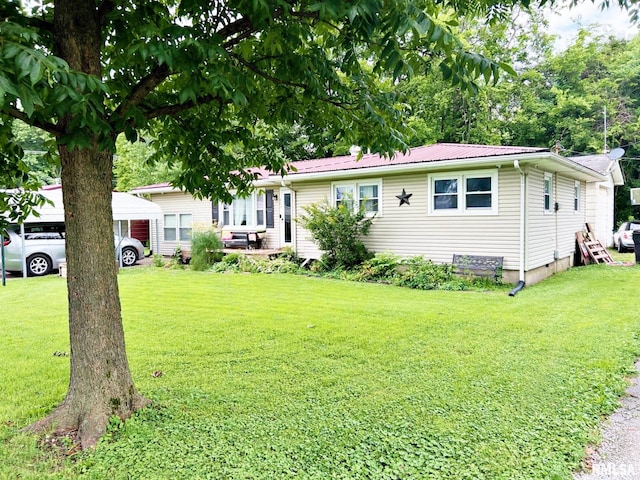 803 Butler St, Metropolis, IL 62960 - ranch-style home with a front lawn and a metal roof