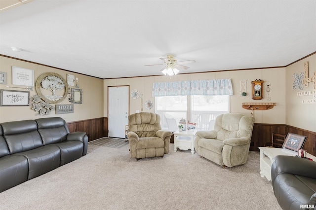 11149 Crenshaw Rd, Marion, IL 62922 - carpeted living room featuring wooden walls, a wainscoted wall, ornamental molding, and a ceiling fan