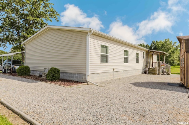 11149 Crenshaw Rd, Marion, IL 62922 - view of side of home featuring crawl space and driveway