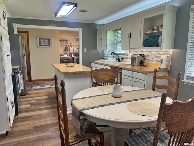 4139 Altenberger Rd, Metropolis, IL 62960 - dining room featuring crown molding and wood finished floors