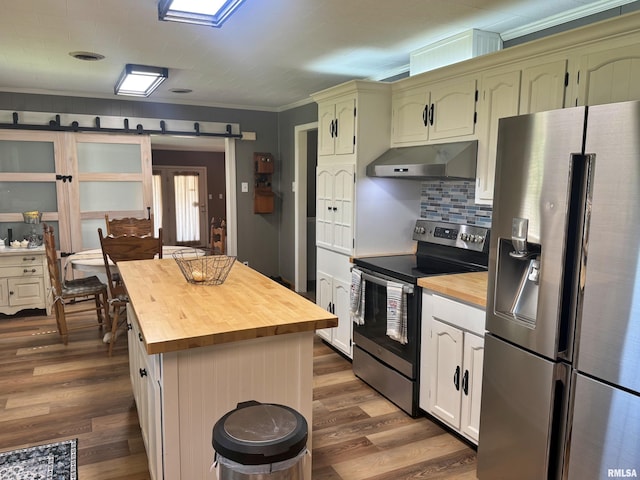4139 Altenberger Rd, Metropolis, IL 62960 - kitchen featuring appliances with stainless steel finishes, wood counters, extractor fan, dark wood-style flooring, and a barn door