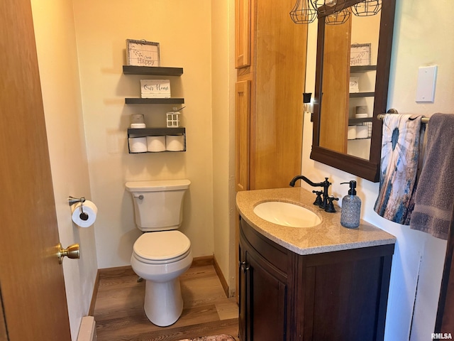 4139 Altenberger Rd, Metropolis, IL 62960 - half bathroom with vanity and wood finished floors