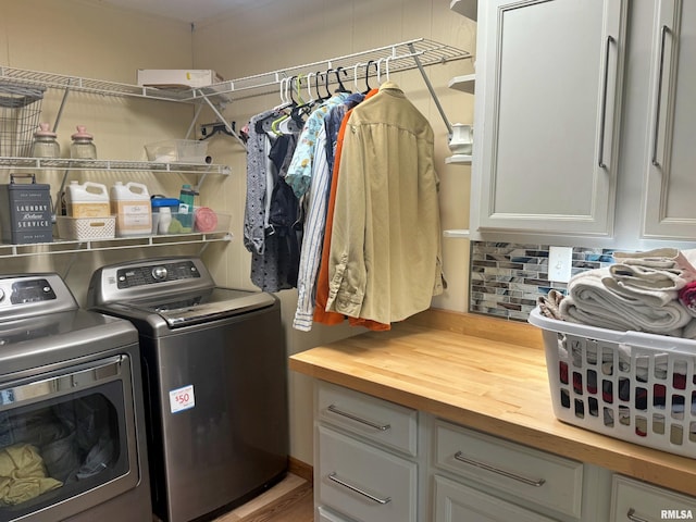 4139 Altenberger Rd, Metropolis, IL 62960 - laundry area with washing machine and dryer and cabinet space
