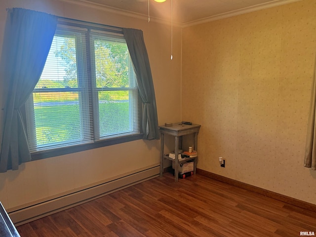4139 Altenberger Rd, Metropolis, IL 62960 - spare room with a baseboard heating unit, crown molding, and wood finished floors