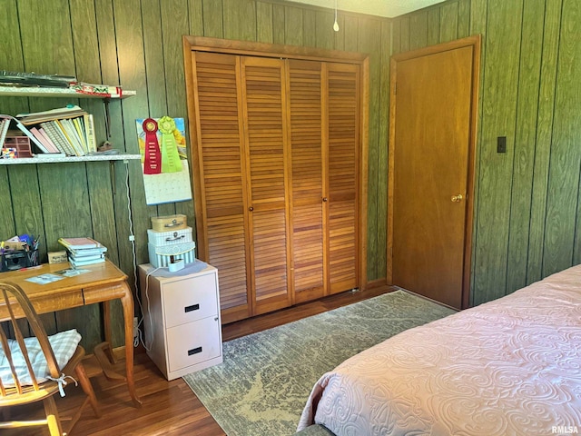 4139 Altenberger Rd, Metropolis, IL 62960 - bedroom with wood walls, wood finished floors, and a closet