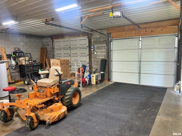 4139 Altenberger Rd, Metropolis, IL 62960 - garage featuring concrete block wall and a garage door opener