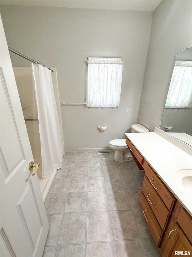 202 Flora Ave, Flora, IL 62839 - full bathroom with vanity, shower / tub combo with curtain, and tile patterned flooring