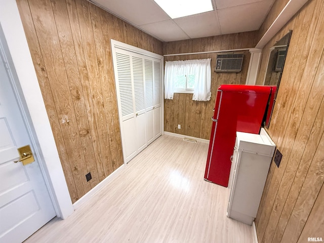 202 Flora Ave, Flora, IL 62839 - hall featuring wood walls, a wall mounted AC, and wood finished floors