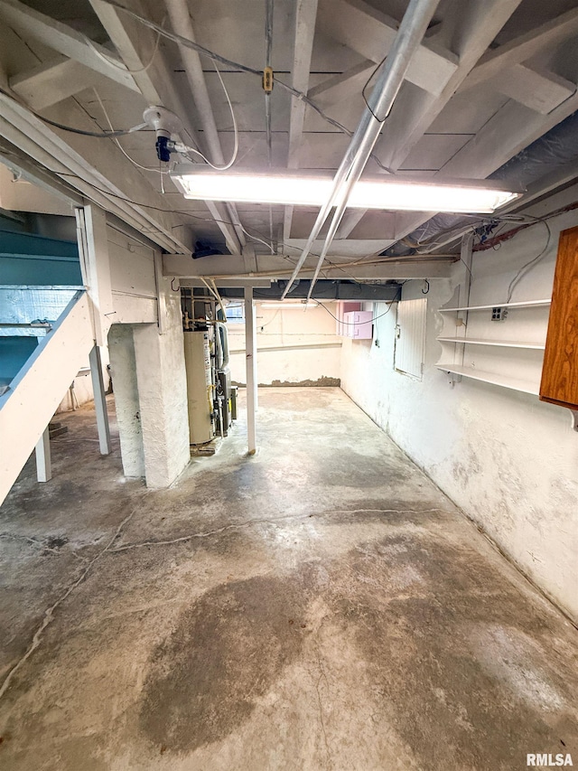 202 Flora Ave, Flora, IL 62839 - unfinished below grade area featuring water heater