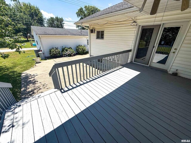 202 Flora Ave, Flora, IL 62839 - deck featuring a yard and a patio area