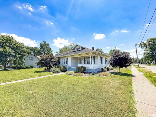 202 Flora Ave, Flora, IL 62839 - view of front of home with a front lawn