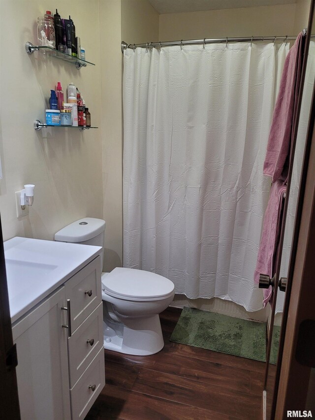11968 E Goshen Meadows Rd, Mount Vernon, IL 62864 - bathroom featuring wood finished floors, vanity, and curtained shower