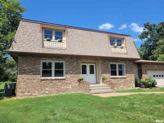 11968 E Goshen Meadows Rd, Mount Vernon, IL 62864 - view of front facade featuring brick siding, a front yard, and roof with shingles