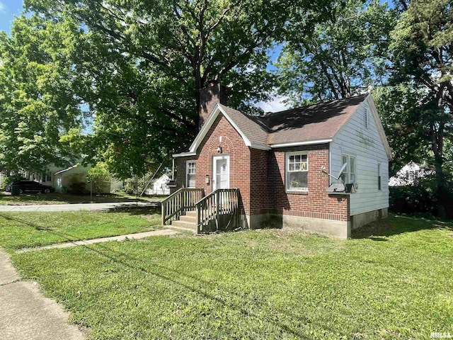 300 N Oakland Ave, Carbondale, IL 62901 - bungalow-style home with a chimney, a front lawn, and brick siding