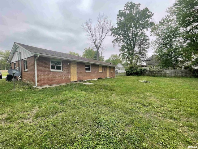 703 W High St, Carbondale, IL 62901 - back of house with brick siding