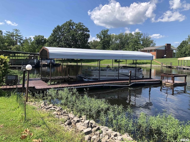 1382 Nicklaus Ln, Marion, IL 62959 - dock featuring boat lift and a water view