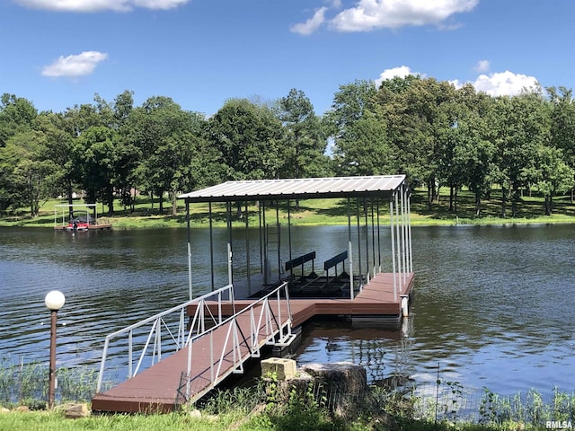 1382 Nicklaus Ln, Marion, IL 62959 - dock with a water view, view of wooded area, and boat lift