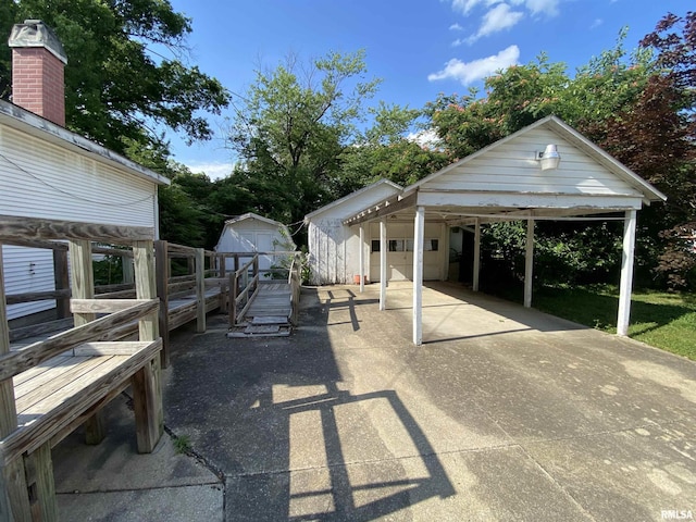 333 S Hickory St, Centralia, IL 62801 - view of patio with a garage and a storage shed