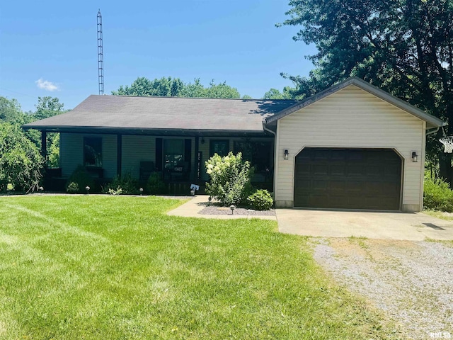 348 Medlin Rd, Walnut Hill, IL 62893 - single story home with gravel driveway, an attached garage, and a front lawn