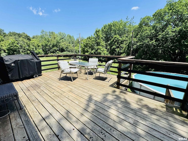 348 Medlin Rd, Walnut Hill, IL 62893 - wooden deck with grilling area and outdoor dining area