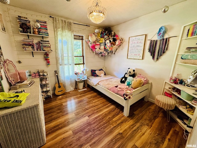 348 Medlin Rd, Walnut Hill, IL 62893 - bedroom with wood finished floors and a chandelier