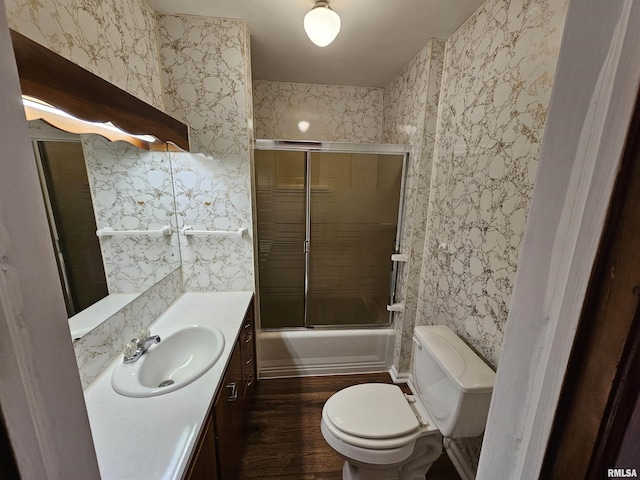 2500 Perkins Ave, Mount Vernon, IL 62864 - bathroom with vanity, wood finished floors, shower / bath combination with glass door, and wallpapered walls