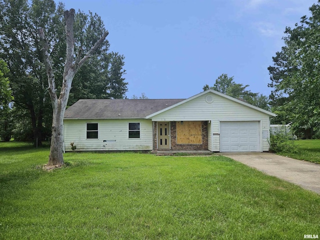 1605 E Pickett Ln, Marion, IL 62959 - ranch-style home with a front lawn, concrete driveway, and an attached garage