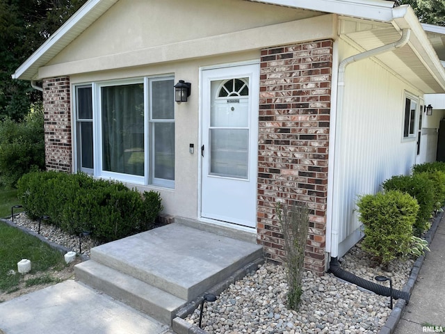 304 S Plover Dr, Carbondale, IL 62901 - doorway to property with brick siding