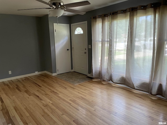 304 S Plover Dr, Carbondale, IL 62901 - foyer with light wood finished floors and a ceiling fan