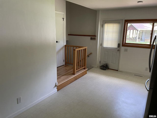 304 S Plover Dr, Carbondale, IL 62901 - foyer with baseboards and tile patterned floors