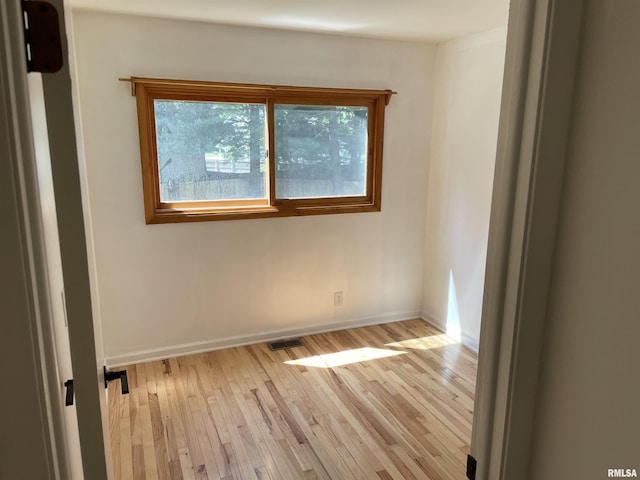 304 S Plover Dr, Carbondale, IL 62901 - spare room with light wood-type flooring and baseboards
