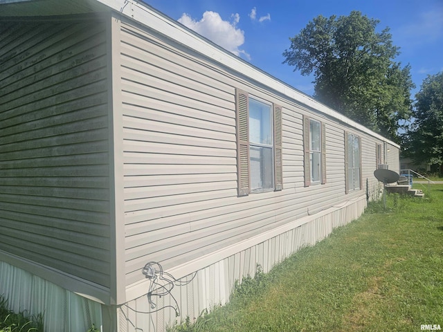 120 E 1st St, Bonnie, IL 62816 - view of home's exterior with a yard