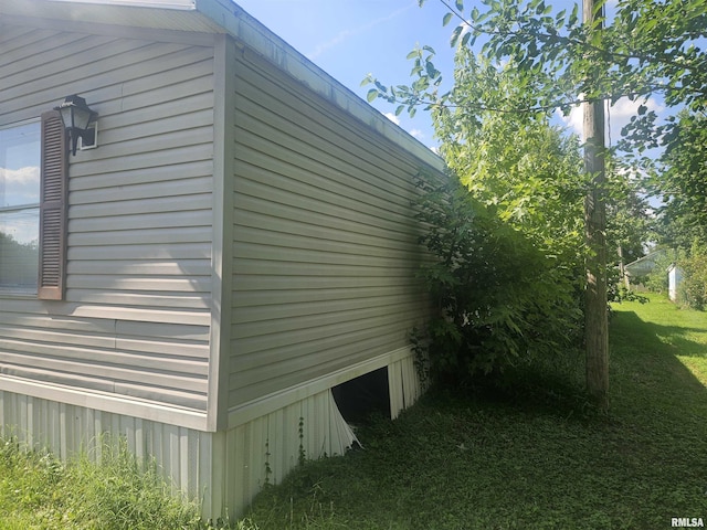 120 E 1st St, Bonnie, IL 62816 - view of side of property with a lawn